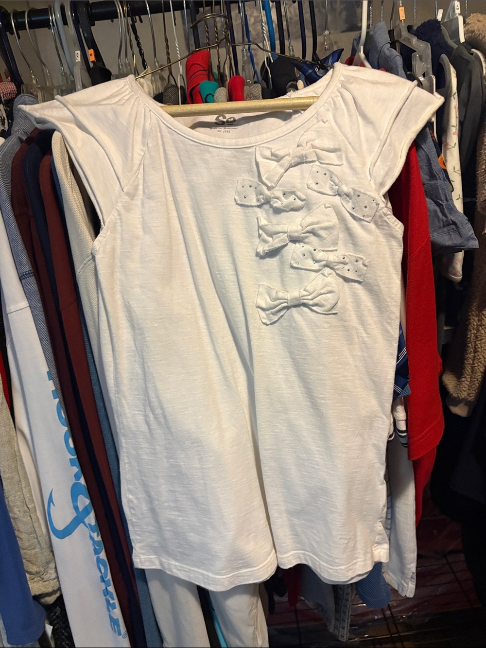 white shirt with bows